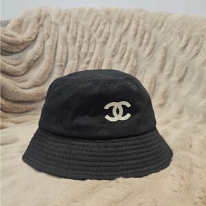 CHANEL Black Quilted Bucket Hat with Signature Tag